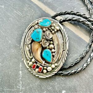 James Shay signed bolo tie, Navajo bear claw natural turquoise and coral.
